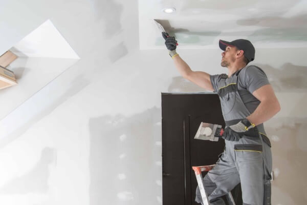 Frederick Handyman finishing drywall ceiling